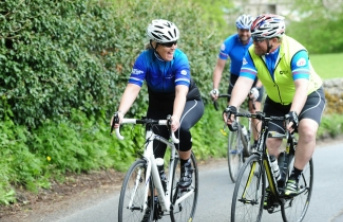 A small group of cyclists together