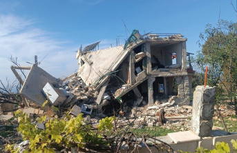 Concrete shell of a destroyed house