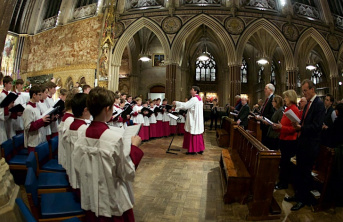 Priest and Choir boys performing at Christmas Carol Service