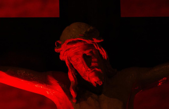 A crucifix lit up in red