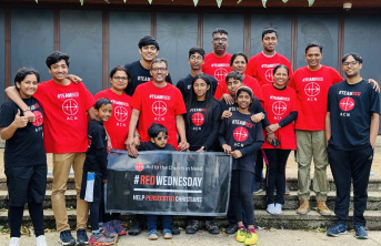 Fundraising family with ACN #RedWednesday banner