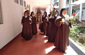 Nun's walking down a halway