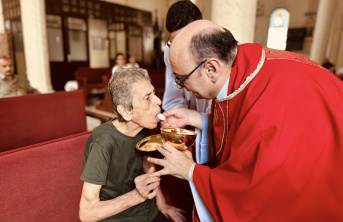 Father Gabriel Romanelli during the mass at Holy Family Church in Gaza 