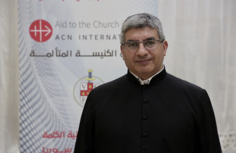 Priest visiting ACN International headquarters