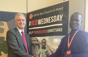 Tobias Yahaya shaking the UK Government FoRB Envoy David Smith MP