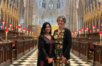 Ribqa Nevash and Caroline Hull standing in Westminster Abbey