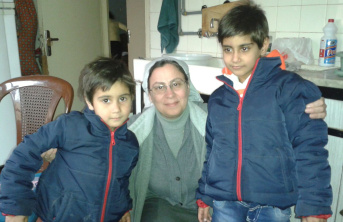  Syria-based Sister Annie Demerjian with displaced children