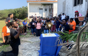 Youth praying during the adoration