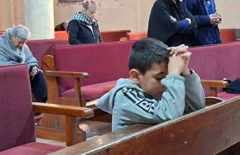 Young boy praying in Gaza