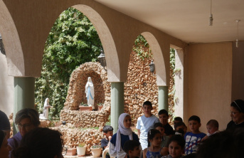 Children and Sisters of the Sisters of Our Lady of Good Help at an orphanage in Lebanon