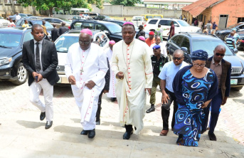 Bishop Jude Arogundade entering the St Francis Xavier Church shortly after the massacre in 2022 