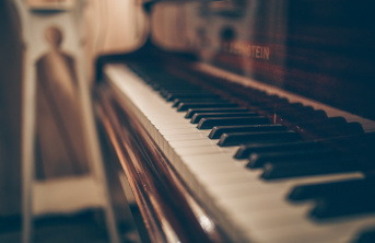 A close up view of piano keys with low depth of field