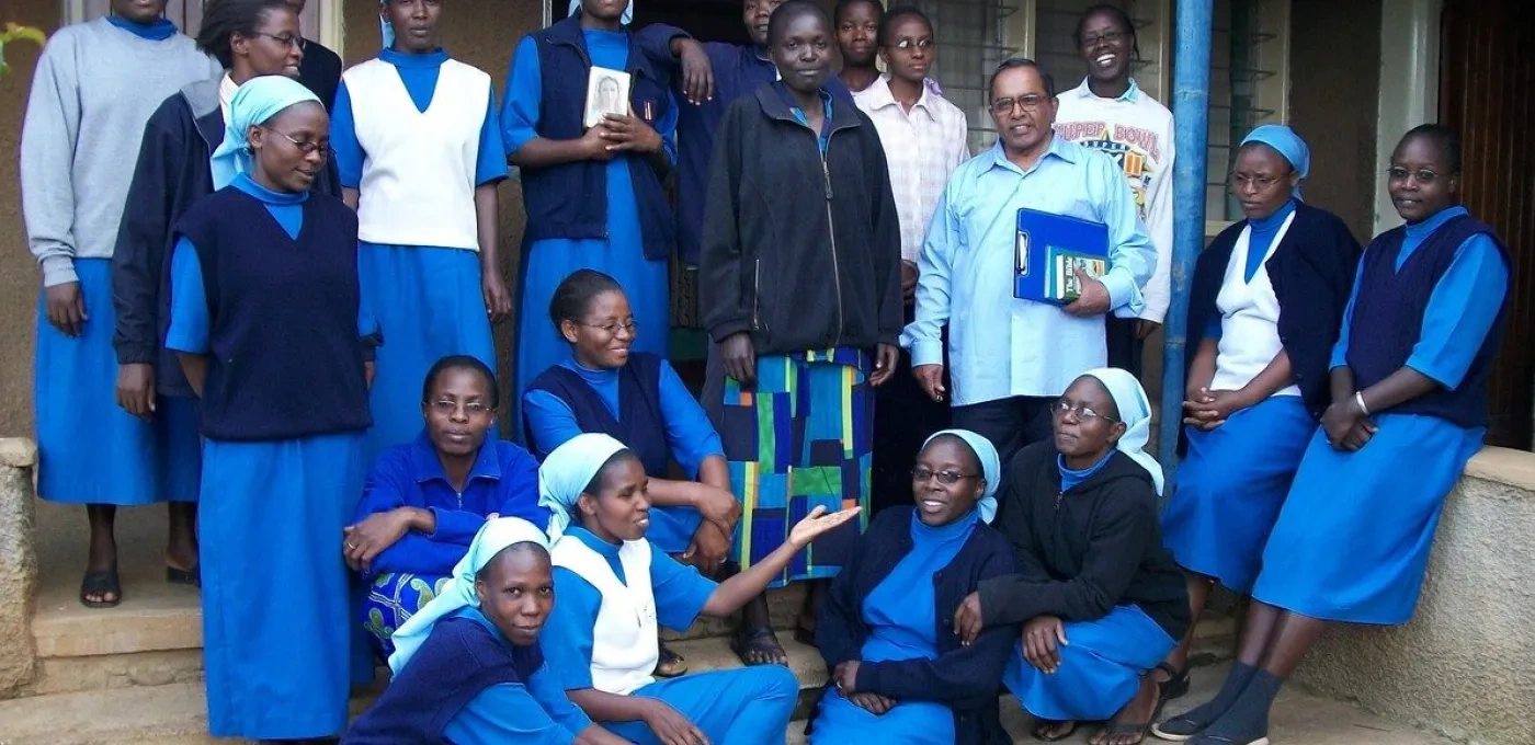 A group of African Sisters wearing blue religious clothing