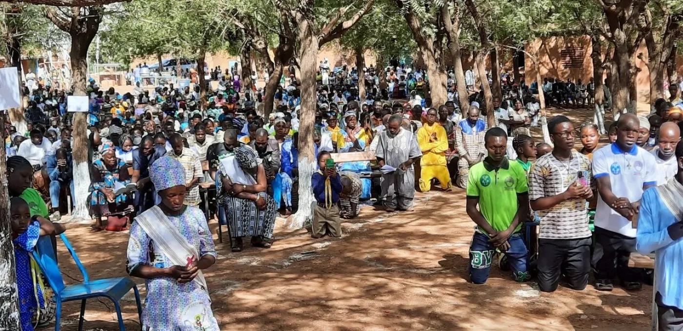 Christians praying in Burkina Faso.