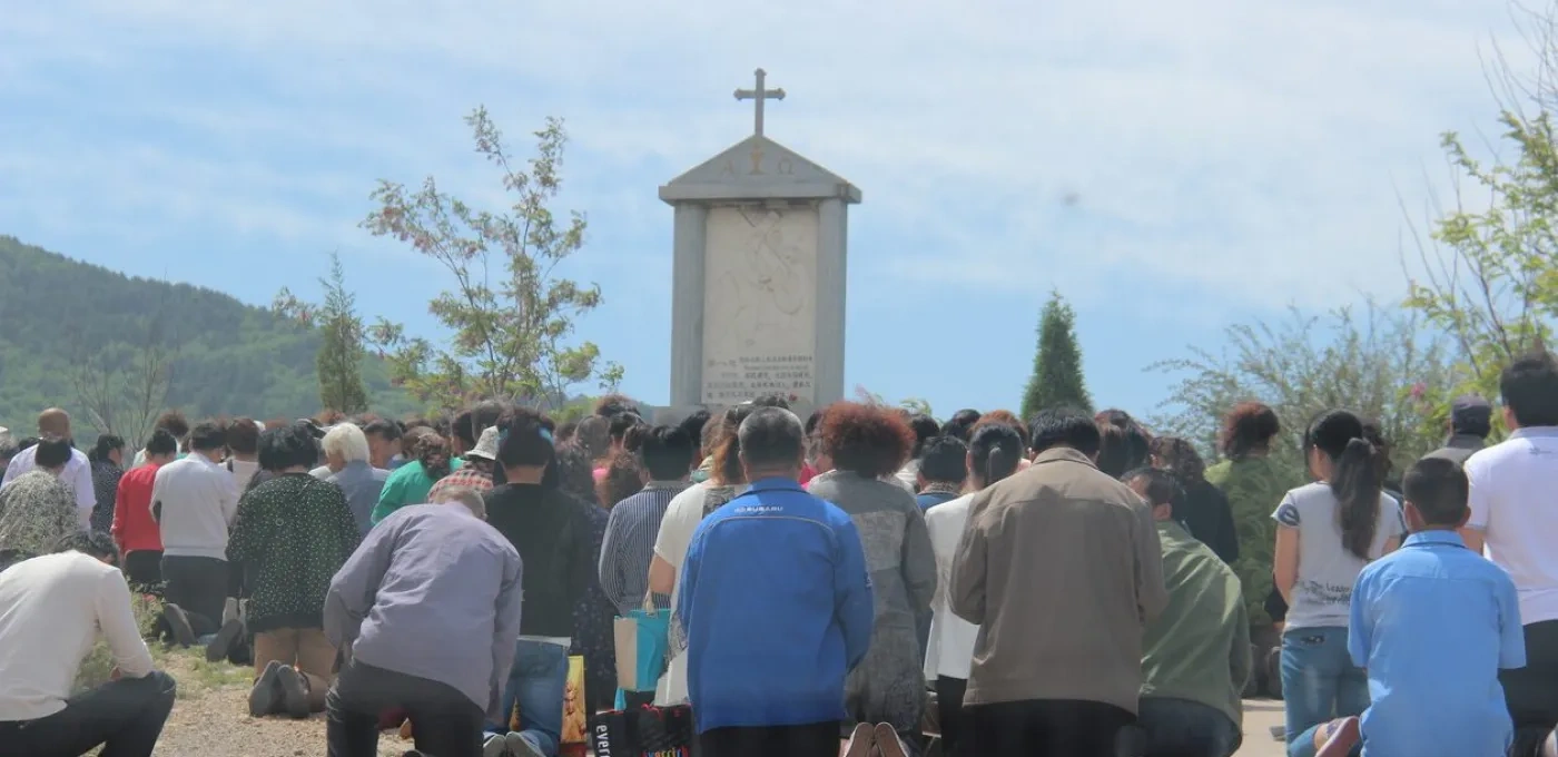 Catholics praying in China.
