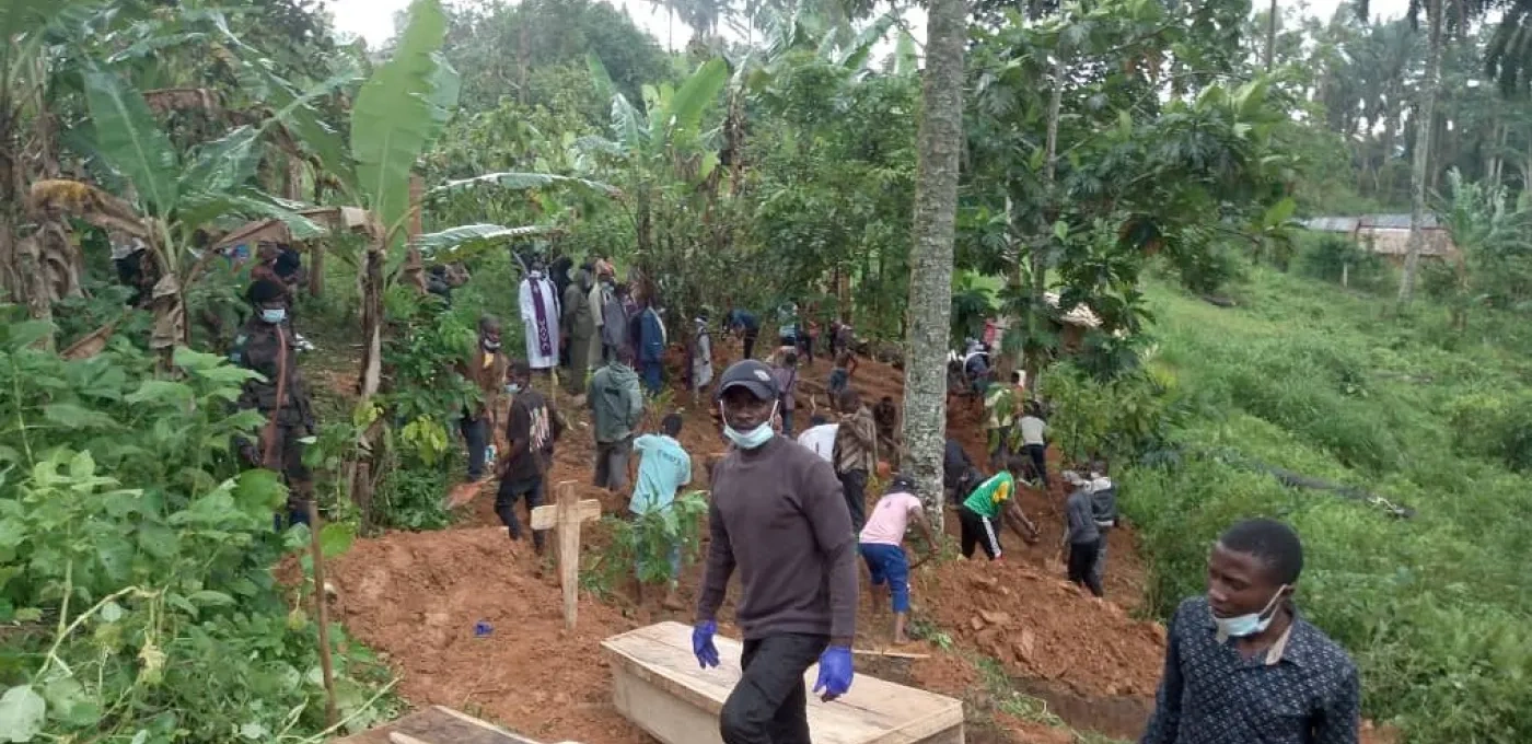 People burying victims in a forest area after ADF massacres in the DRC.