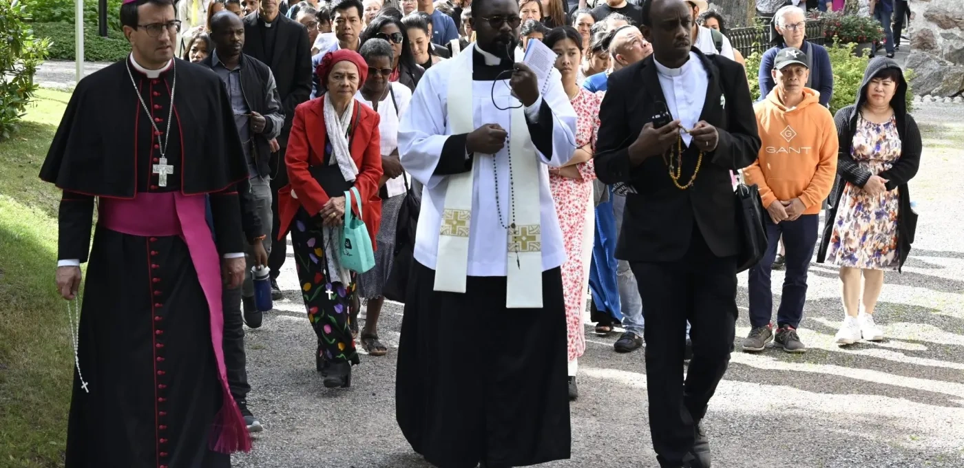 Priests and Catholics walking together