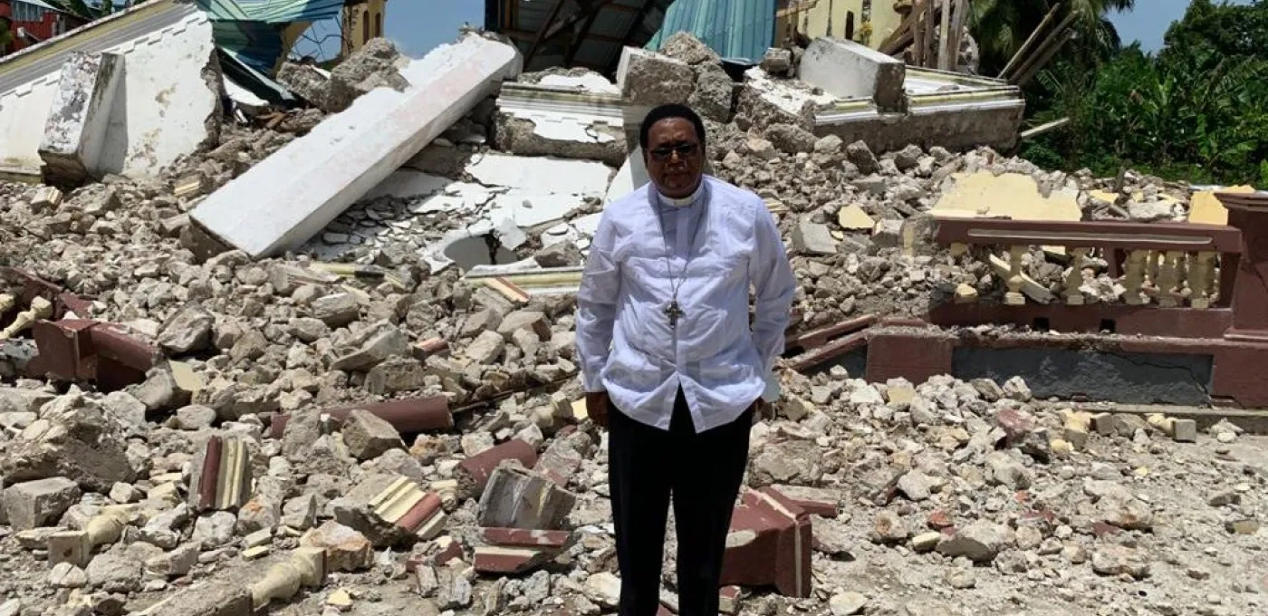 Bishop Pierre-Andre Dumas at a church in Anse-à-Veau-Miragoâne Diocese after an earthquake.