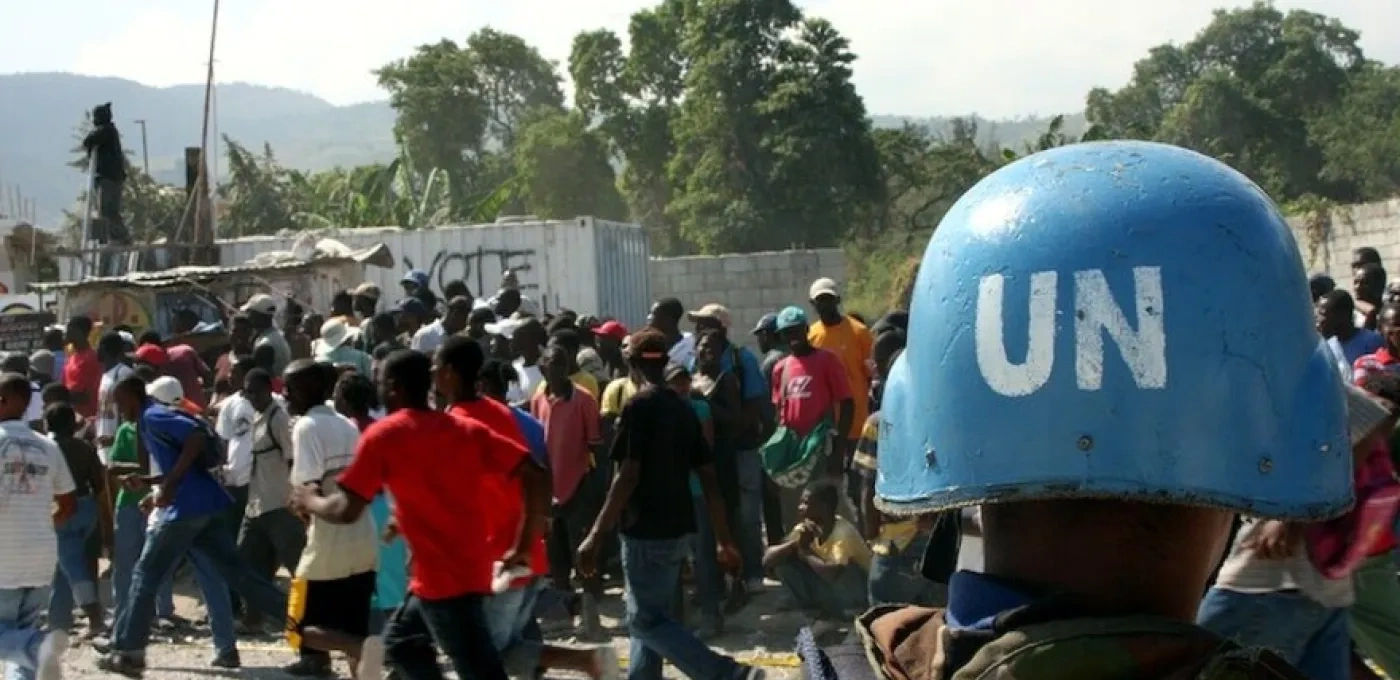Military in UN helmet monitor mobs on the streets of Haiti