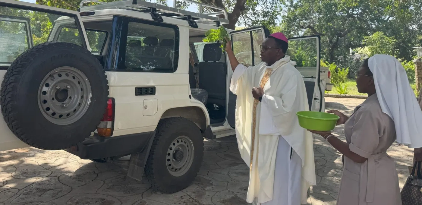 Sister and priest presented with a 4x4 vehicle
