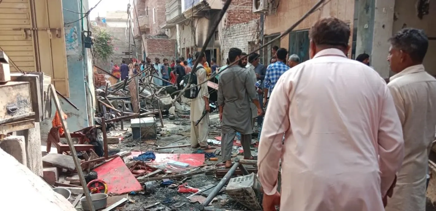Group of people walking through arson attacked streets