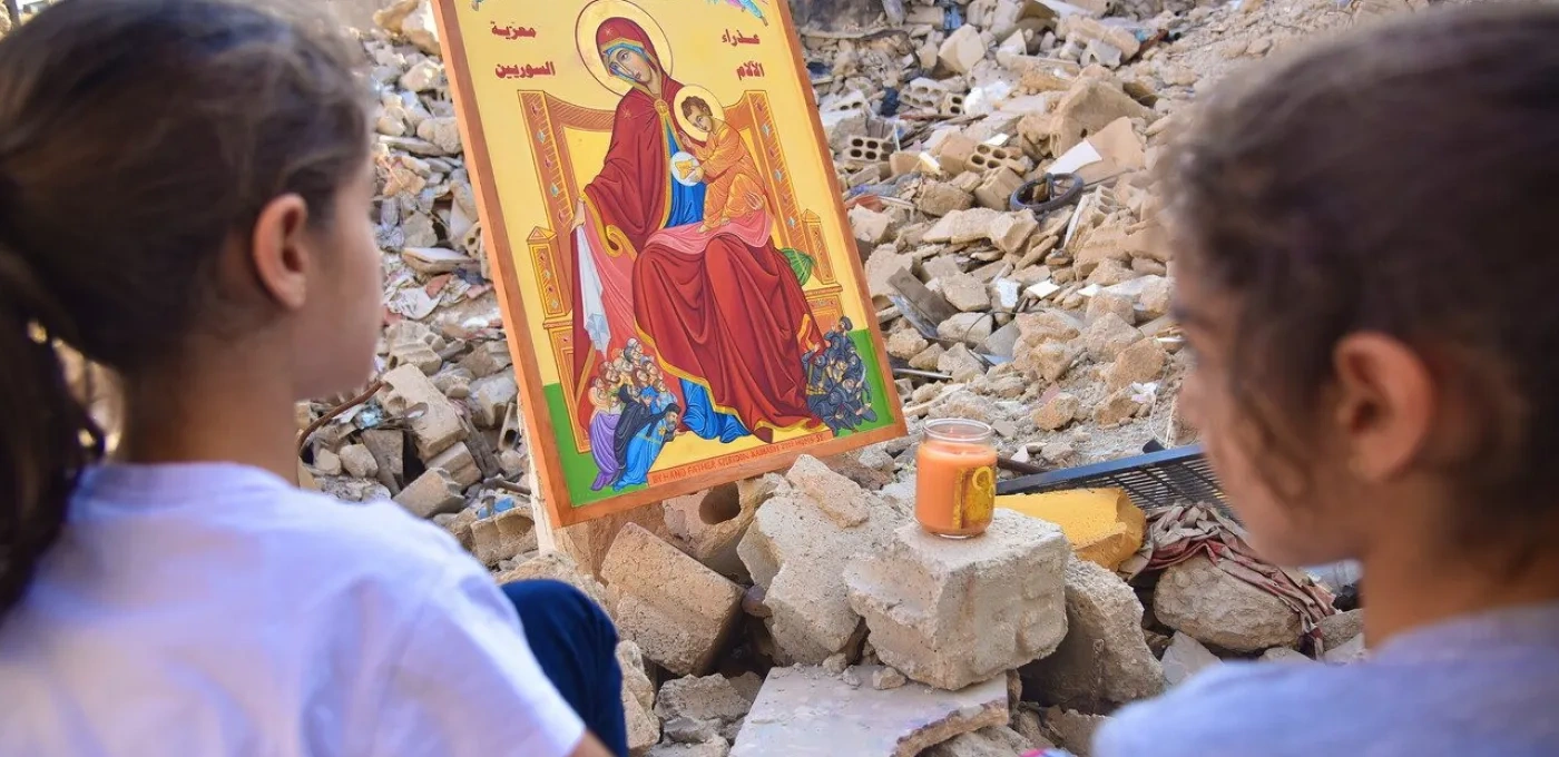 Children praying in Eastern Ghouta, Syria.