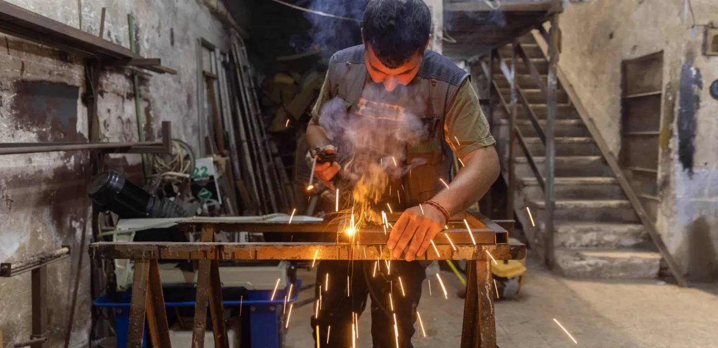 Man working in his smithy.