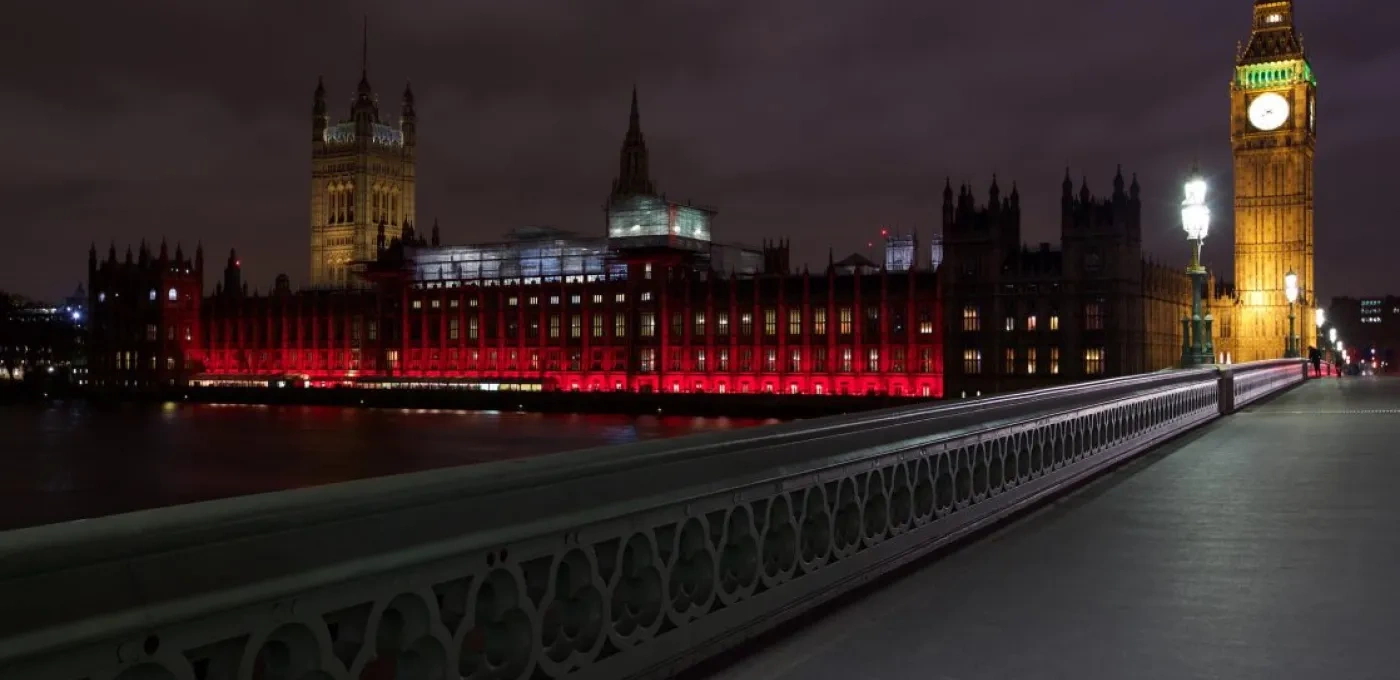 The Houses of Parliament lit red for #RedWednesday in 2016