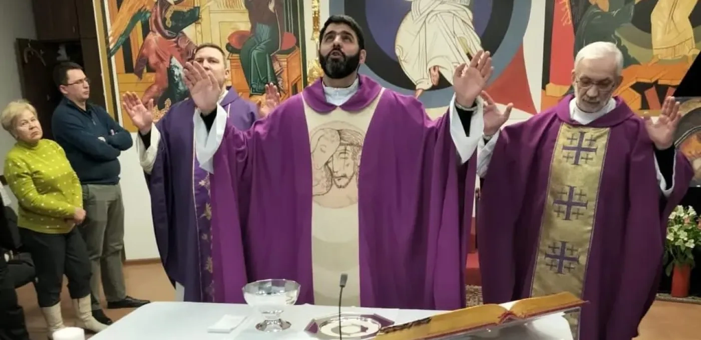 Priest serving Mass in Ukraine