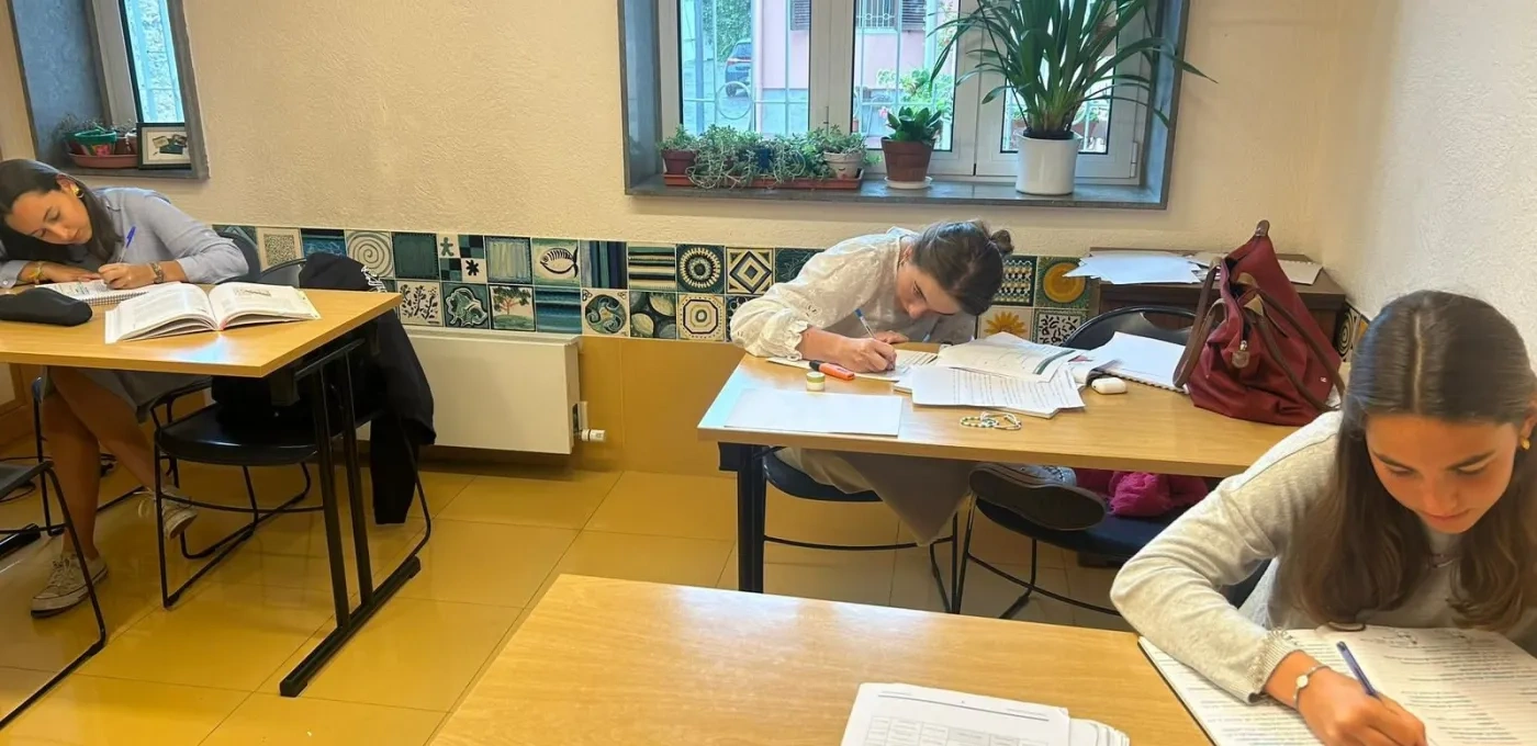 Children in Ukraine at their desks writing a test