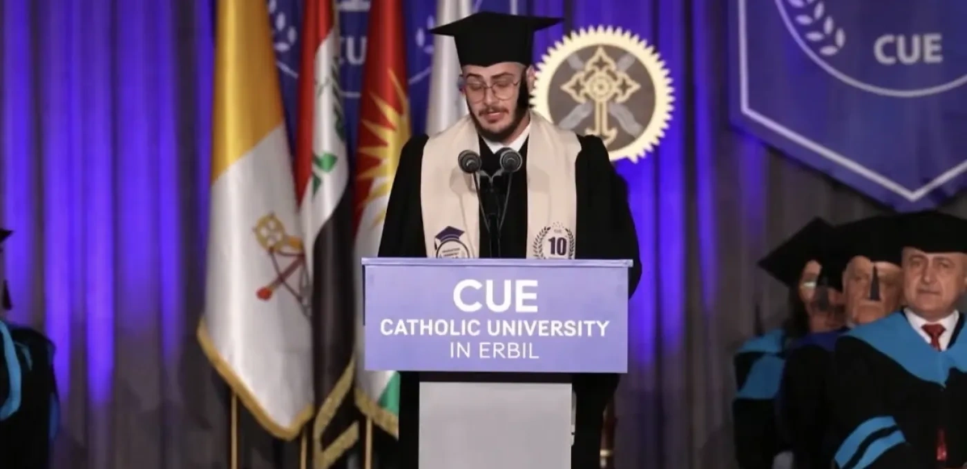 Yohana Yaqoob Abdeesh Al-Zeebaree speaking to CUE graduates