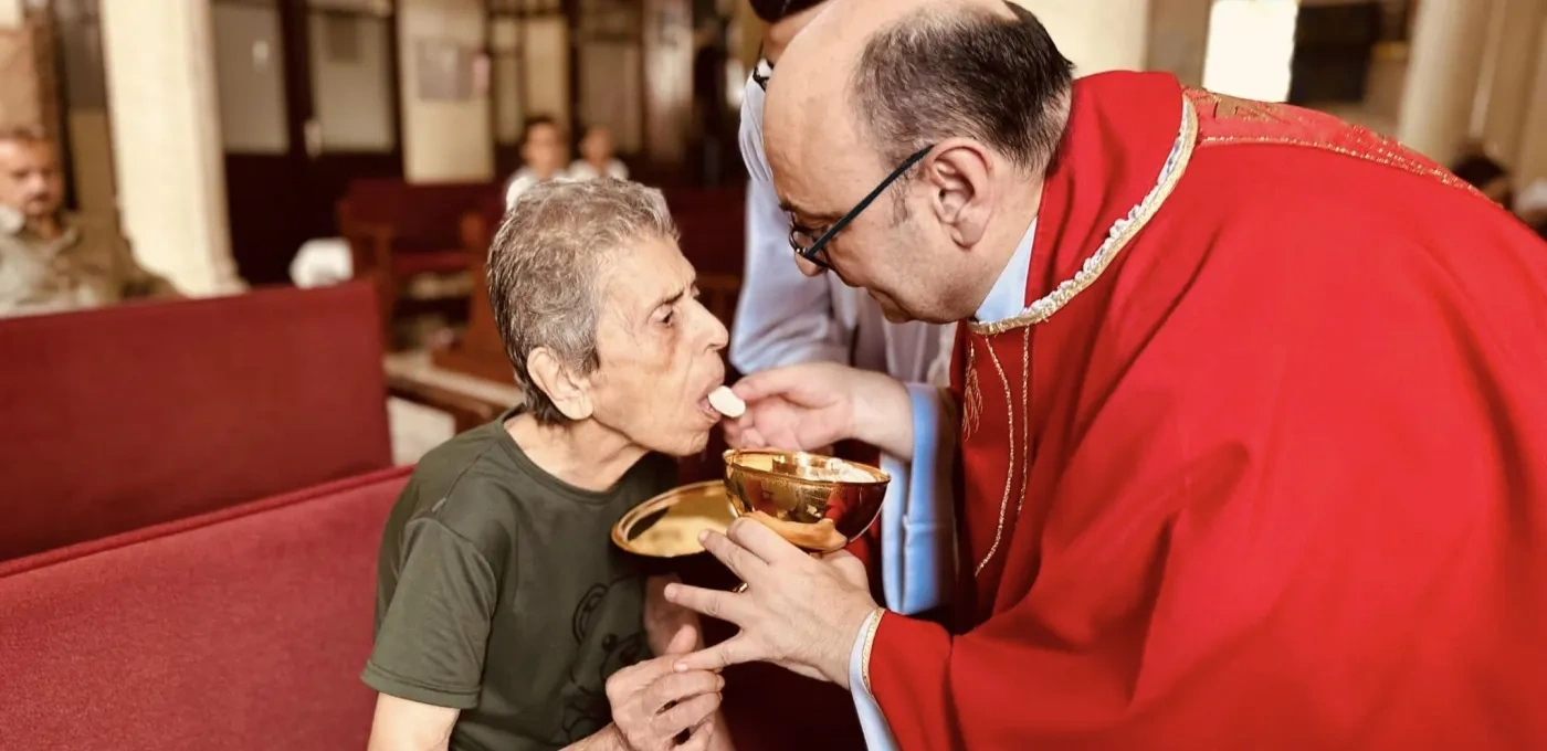 Father Gabriel Romanelli during the mass at Holy Family Church in Gaza 