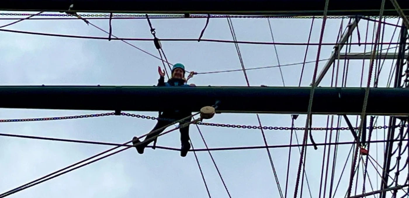 Amy Balog climbing the Cutty Sark Rig in Greenwich