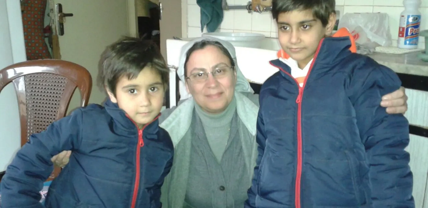  Syria-based Sister Annie Demerjian with displaced children