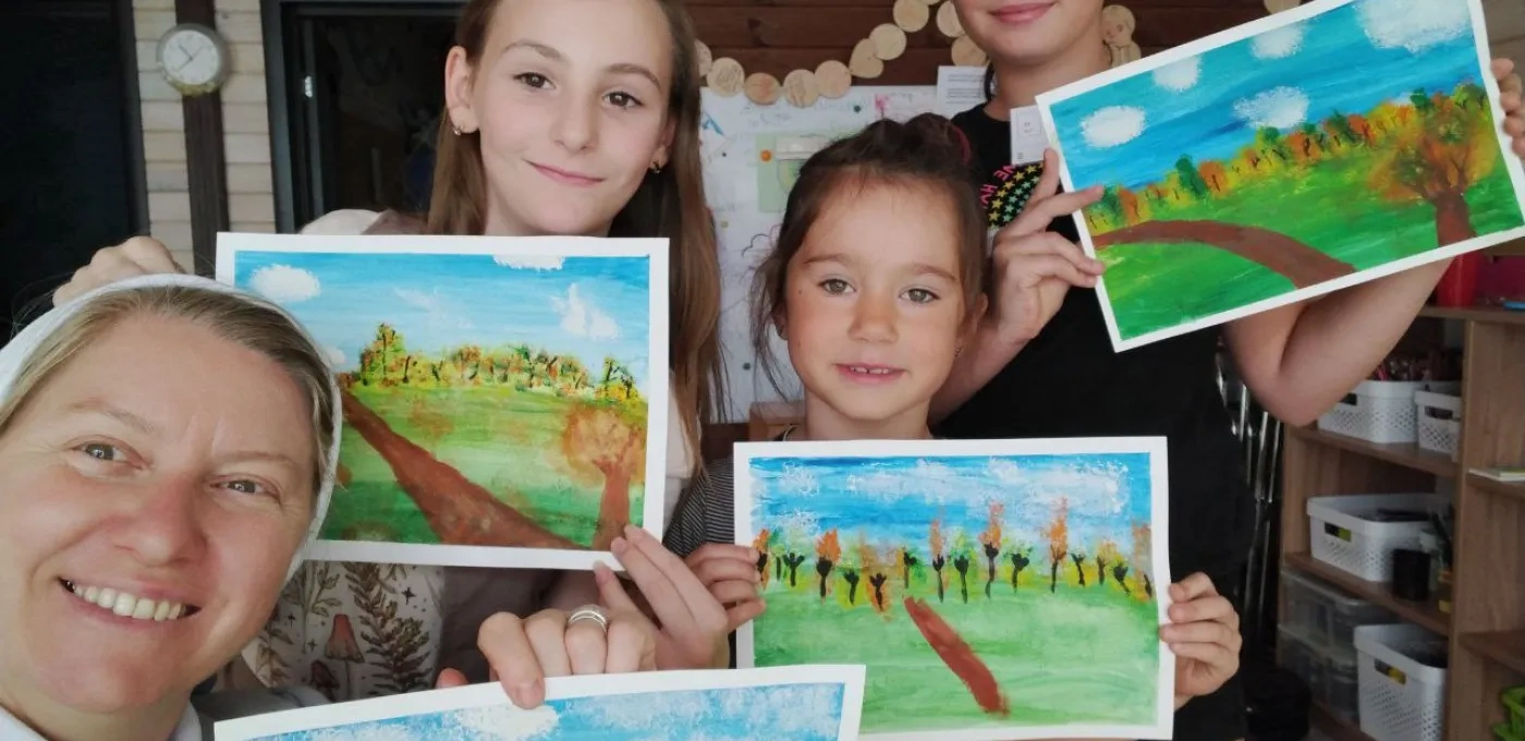 Sister with young girls they are supporting in Ukraine