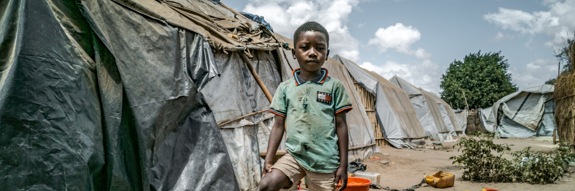 Small Nigerian boy with a football in IDP Camp
