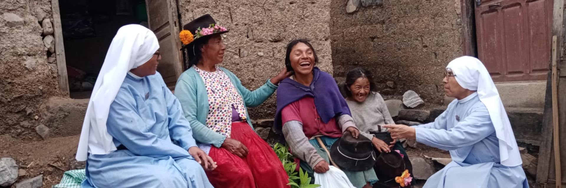 Sisters talking to parishioners in Bolivia