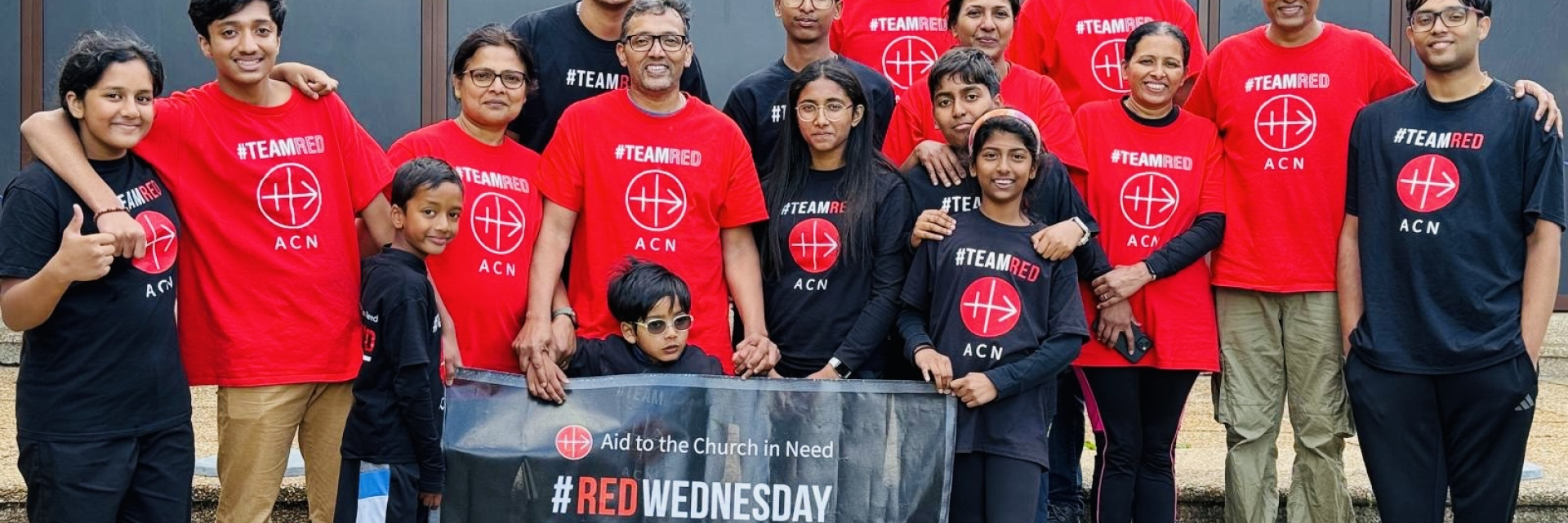 Fundraising family with ACN #RedWednesday banner
