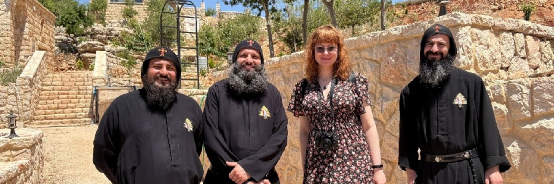 Amy Balog from ACN (UK) with three of the Brothers of Beit Maroun