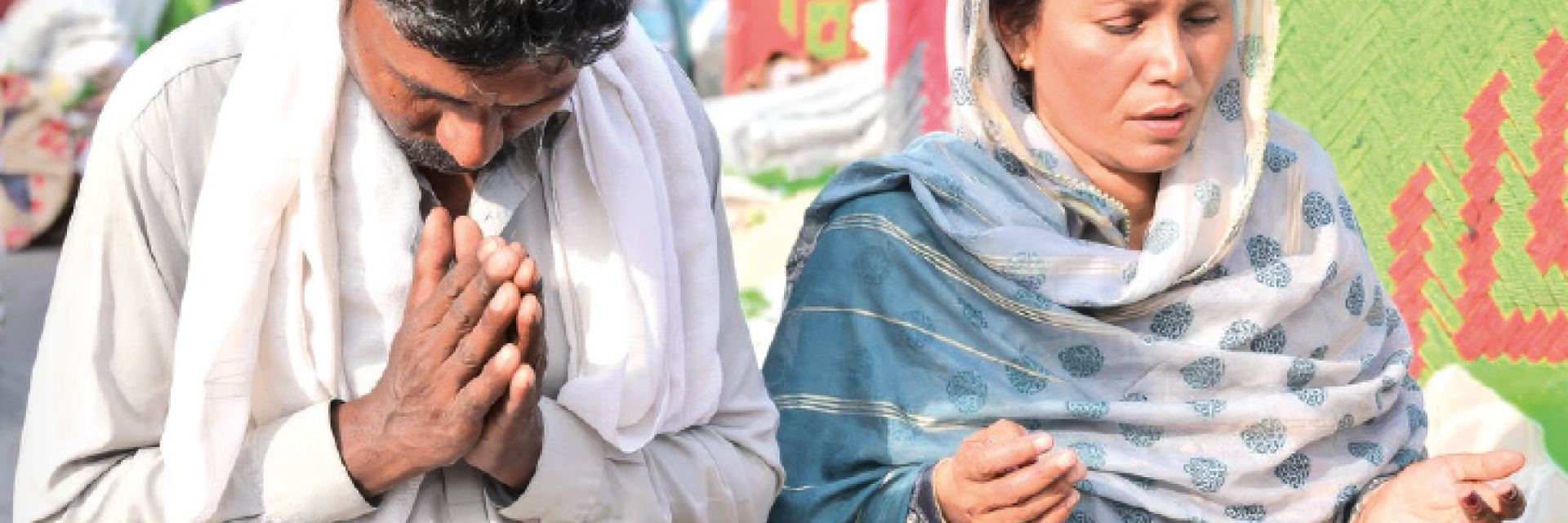 Two Catholics praying
