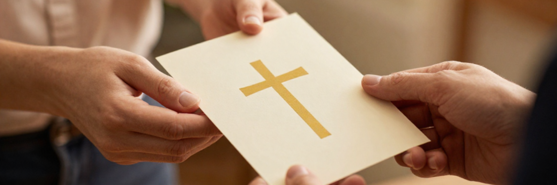 Someone handing another person a card with a cross on it