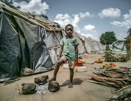 Small Nigerian boy with a football in IDP Camp