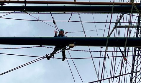 Amy Balog climbing the Cutty Sark Rig in Greenwich