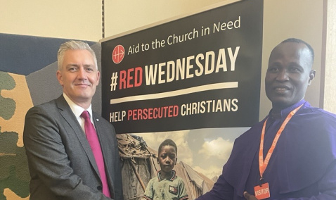 Tobias Yahaya shaking the UK Government FoRB Envoy David Smith MP