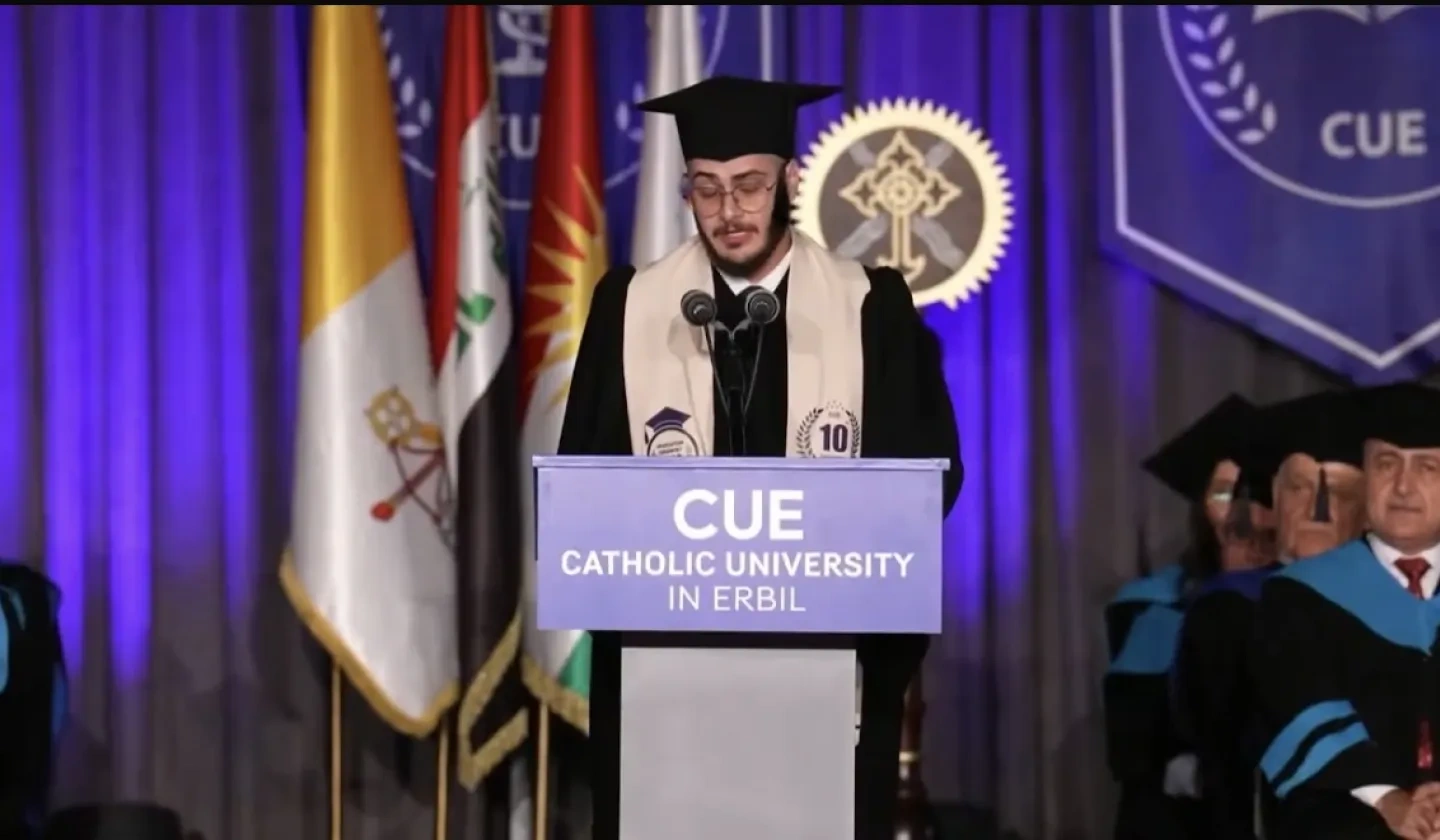 Yohana Yaqoob Abdeesh Al-Zeebaree speaking to CUE graduates