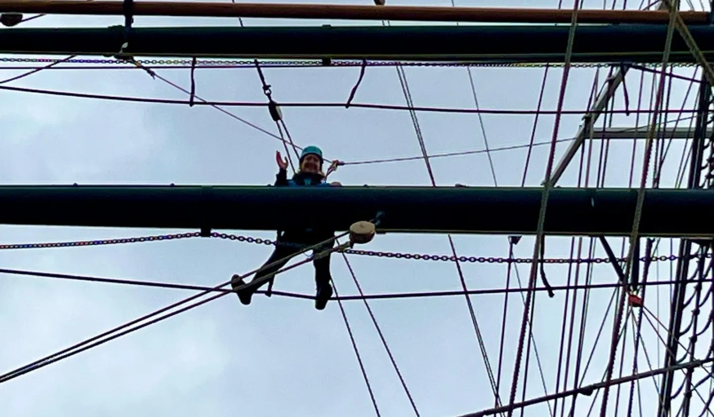 Amy Balog climbing the Cutty Sark Rig in Greenwich