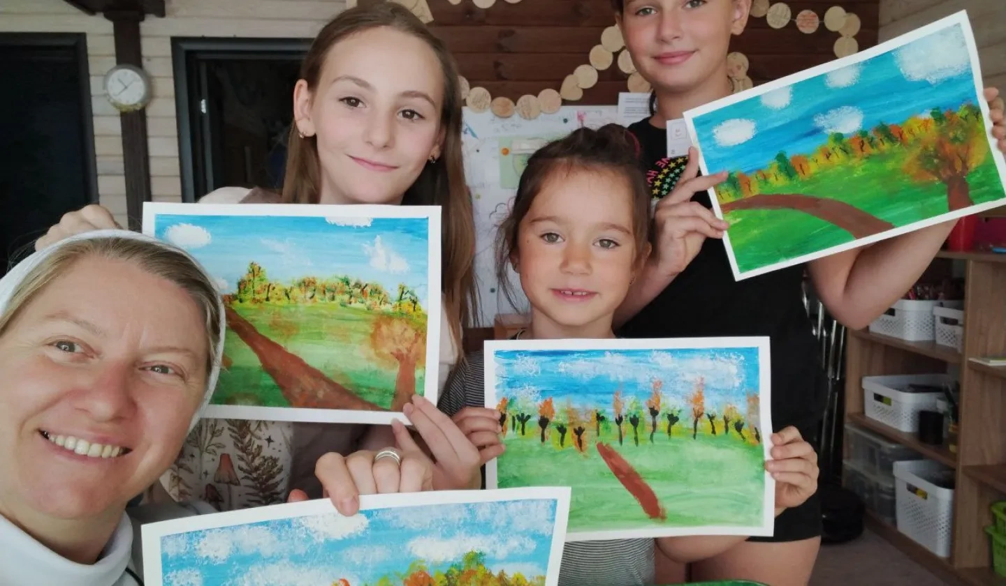 Sister with young girls they are supporting in Ukraine