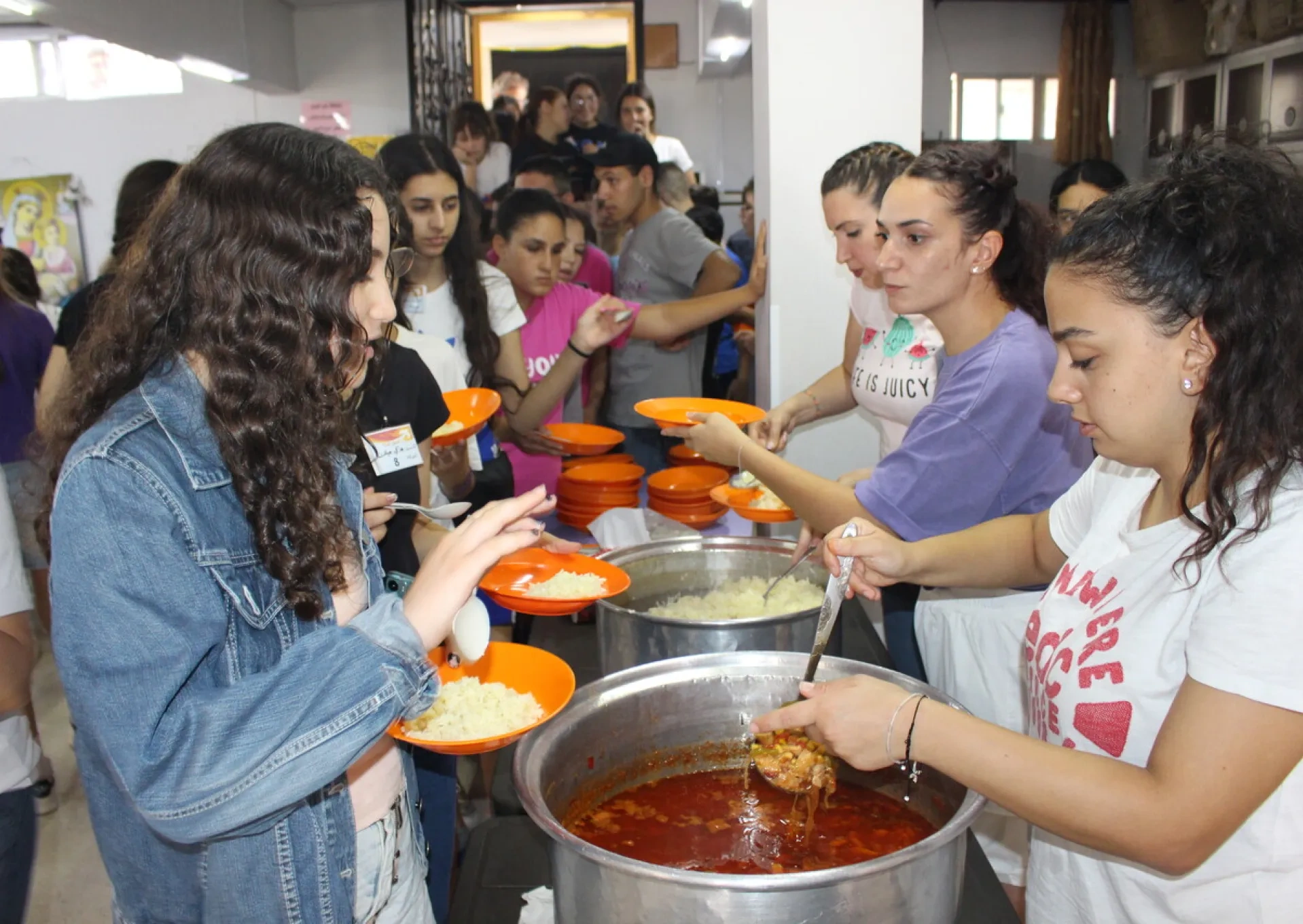 Families being served hot meals in Syria