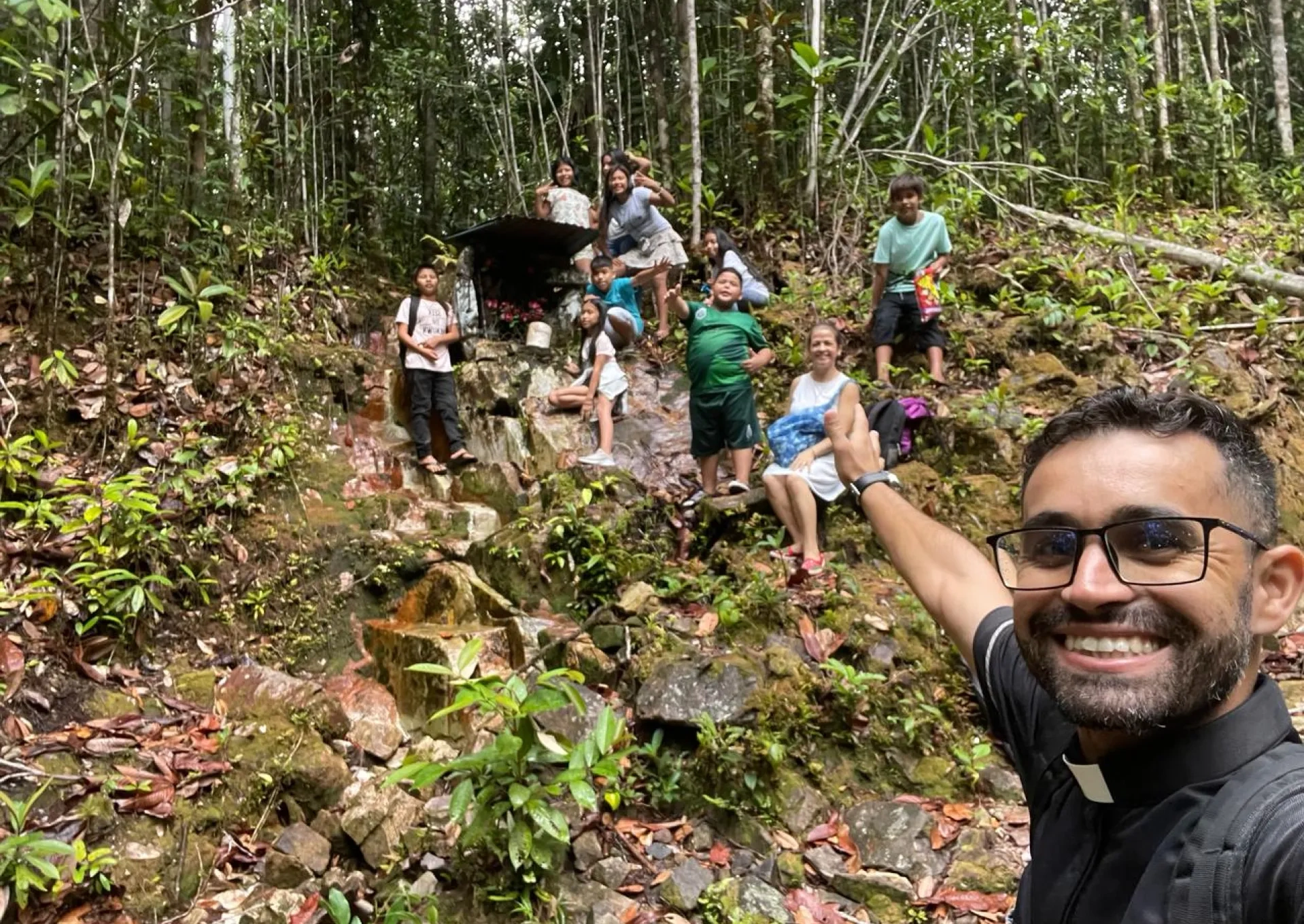 A priest visiting a remote community in the Amazon