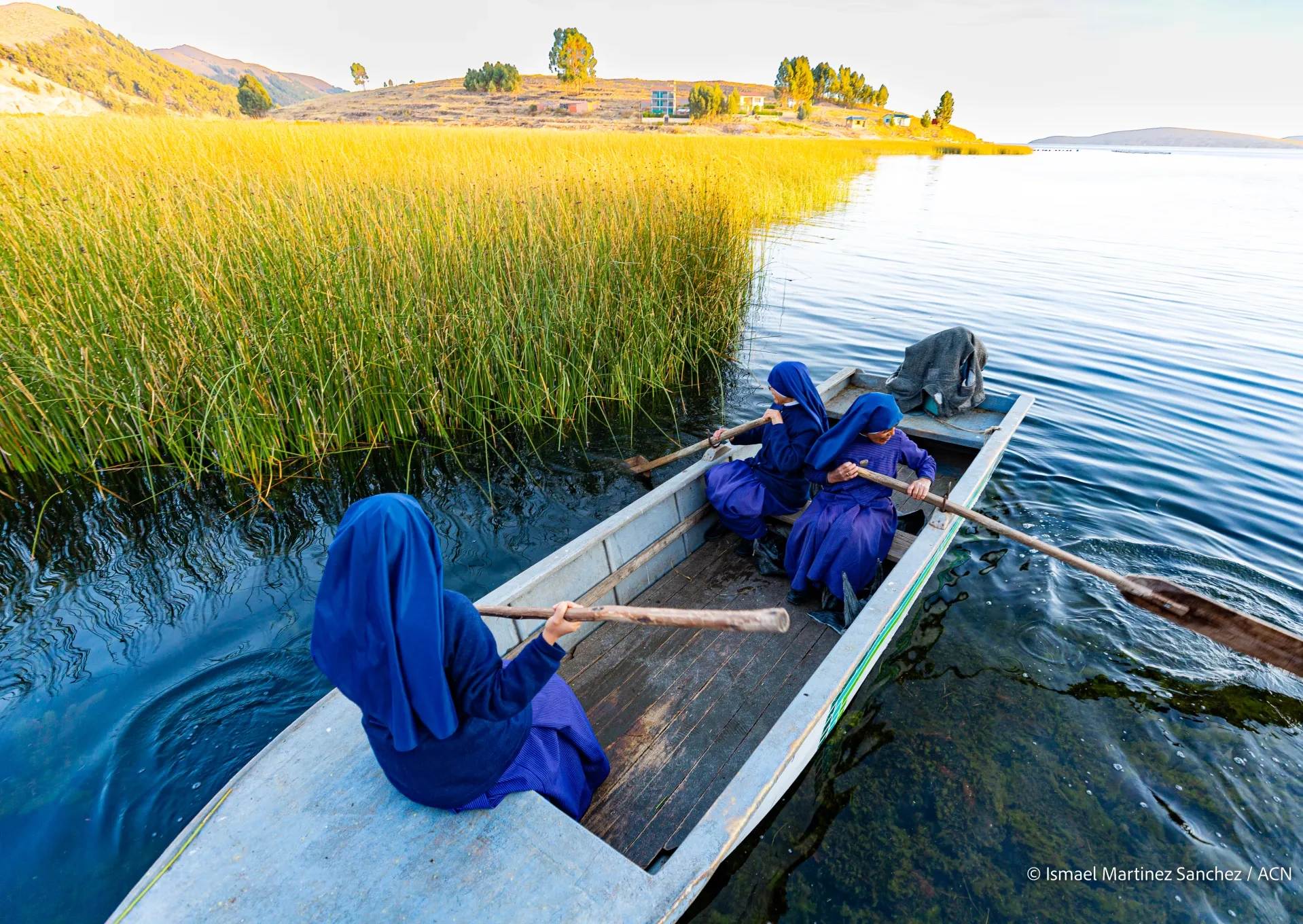 Sisters rowing up a river